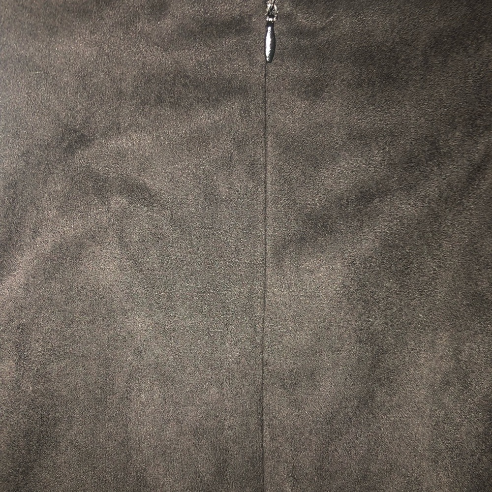 Women’s black lace up suedette mini skirt. Never been worn. Tags still attached